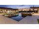 Stunning backyard pool with stone accents, desert landscaping and a serene desert view at 9456 E Sands Dr, Scottsdale, AZ 85255