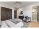 Relaxing bedroom featuring a view of the shower and a large closet at 9456 E Sands Dr, Scottsdale, AZ 85255