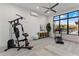 Bright home gym with exercise equipment and large window with an exterior view at 9456 E Sands Dr, Scottsdale, AZ 85255