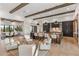 Open-concept living space with a modern kitchen, dining area, and cozy seating, perfect for entertaining at 9456 E Sands Dr, Scottsdale, AZ 85255