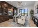 Bright home office featuring custom built-ins and a large window at 9456 E Sands Dr, Scottsdale, AZ 85255