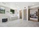A spacious bathroom offers natural light, a soaking tub, and access to the main bedroom at 10040 E Happy Valley Rd # 243, Scottsdale, AZ 85255