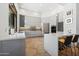 The modern kitchen is equipped with stainless steel appliances at 10040 E Happy Valley Rd # 243, Scottsdale, AZ 85255