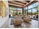 Sitting area has floor to ceiling windows boasting desert views at 10040 E Happy Valley Rd # 243, Scottsdale, AZ 85255