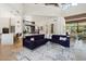 Great Room showcases floor-to-ceiling windows and desert views at 10040 E Happy Valley Rd # 243, Scottsdale, AZ 85255
