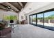 Upstairs living area featuring wood-beamed ceilings, a desk area, and desert views at 10040 E Happy Valley Rd # 243, Scottsdale, AZ 85255
