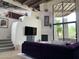 Living room boasts high ceilings, stacked fireplace, with staircase to loft space, all flooded with natural light at 10040 E Happy Valley Rd # 243, Scottsdale, AZ 85255