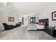 Spacious primary bedroom featuring neutral colors, ample seating, and access to a private outdoor space at 10040 E Happy Valley Rd # 243, Scottsdale, AZ 85255