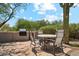Outdoor dining area with built-in grill and seating, perfect for enjoying desert views at 10040 E Happy Valley Rd # 243, Scottsdale, AZ 85255