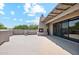 Spacious rooftop patio with a fireplace, built-in seating, and stunning views at 10040 E Happy Valley Rd # 243, Scottsdale, AZ 85255