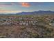 Wide desert valley neighborhood with single Gathering homes and scenic mountain views in the background at 10775 E Peralta Canyon Dr, Gold Canyon, AZ 85118