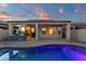 Inviting covered patio with built-in grill area and access to the pool, ideal for outdoor entertaining at 10775 E Peralta Canyon Dr, Gold Canyon, AZ 85118