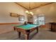 Well-lit billiards room with a pool table and comfortable seating at 10775 E Peralta Canyon Dr, Gold Canyon, AZ 85118