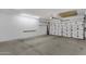 Clean and spacious garage with insulated garage door at 10775 E Peralta Canyon Dr, Gold Canyon, AZ 85118