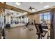 Well-lit gym featuring various exercise machines and free weights for a complete fitness experience at 10775 E Peralta Canyon Dr, Gold Canyon, AZ 85118