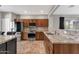 Stylish kitchen featuring stainless steel appliances, granite countertops, and modern cabinetry for functionality at 10775 E Peralta Canyon Dr, Gold Canyon, AZ 85118