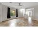 Inviting living room with tile floors, a large window with drapes, and open layout at 10775 E Peralta Canyon Dr, Gold Canyon, AZ 85118