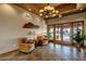 Comfortable lobby area with sitting area and view of the entrance at 10775 E Peralta Canyon Dr, Gold Canyon, AZ 85118
