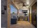 Covered patio featuring outdoor kitchen with grill, smoker and refrigerator at 10775 E Peralta Canyon Dr, Gold Canyon, AZ 85118