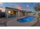 Sparkling private pool with covered patio and outdoor kitchen at 10775 E Peralta Canyon Dr, Gold Canyon, AZ 85118