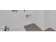 Laundry room featuring tile flooring and white walls at 10860 E Tiburon Ave, Mesa, AZ 85212