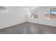 Spacious room with tile floors and multiple windows that offer abundant natural light at 10860 E Tiburon Ave, Mesa, AZ 85212