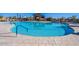 Community pool offers crystal blue water and comfortable lounge chairs at 10860 E Tiburon Ave, Mesa, AZ 85212