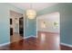 Inviting dining space showcasing an open layout and modern lighting at 1117 W Glenrosa Ave, Phoenix, AZ 85013