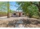 Charming home with a red front door, gravel landscaping, and walkway pavers at 1117 W Glenrosa Ave, Phoenix, AZ 85013