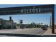 View of the Melrose sign above a street with buildings, shops, and traffic at 1117 W Glenrosa Ave, Phoenix, AZ 85013