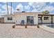 Enjoy outdoor dining on the backyard patio, next to the pool in the low maintenance yard at 11631 N 30Th St, Phoenix, AZ 85028