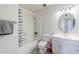 A bright bathroom offers a tub, updated vanity, and a modern sink, providing a clean and functional space at 11631 N 30Th St, Phoenix, AZ 85028