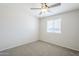 A calm bedroom with carpet and ample natural light promises relaxation and tranquility at 11631 N 30Th St, Phoenix, AZ 85028