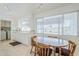 Cozy dining area with natural light, connecting to the kitchen and offering pool views at 11631 N 30Th St, Phoenix, AZ 85028