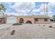 Charming single-story home featuring a well-maintained brick facade and a desert-landscaped front yard at 11631 N 30Th St, Phoenix, AZ 85028