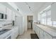 Bright kitchen features white appliances, ample cabinets, and a convenient laundry area at 11631 N 30Th St, Phoenix, AZ 85028