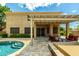 Outdoor living space featuring pool, spa and covered patio at 1268 N Pine St, Gilbert, AZ 85233