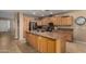 Well-appointed kitchen with granite countertops and wooden cabinetry at 1268 N Pine St, Gilbert, AZ 85233