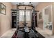 Home workout room featuring power rack with weight bench at 1268 N Pine St, Gilbert, AZ 85233