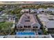 Panoramic aerial view featuring a backyard pool, outdoor lounge, and community at 1337 E Paseo Way, Phoenix, AZ 85042