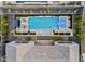 Overhead perspective of a stunning pool and spa with an outdoor living space with a modern design at 1337 E Paseo Way, Phoenix, AZ 85042