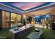 Cozy backyard with a modern fire pit, comfortable seating, and seamless indoor-outdoor living at 1337 E Paseo Way, Phoenix, AZ 85042