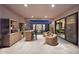 Luxurious backyard with an outdoor bar, comfortable seating, and elegant design perfect for entertaining at 1337 E Paseo Way, Phoenix, AZ 85042