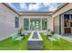 Charming backyard with a modern fire pit and comfortable seating, perfect for relaxing and entertaining guests at 1337 E Paseo Way, Phoenix, AZ 85042