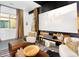 Stylish home theater with a projector screen and chic, comfortable furnishings at 1337 E Paseo Way, Phoenix, AZ 85042