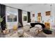 Bright bedroom with large windows, decorative rug, and stylish black-out curtains at 1337 E Paseo Way, Phoenix, AZ 85042