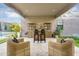Charming outdoor patio showcasing a bar area and comfortable seating, perfect for relaxation and entertaining at 1337 E Paseo Way, Phoenix, AZ 85042