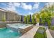 Lush backyard with a luxurious spa and manicured landscaping, ideal for outdoor enjoyment at 1337 E Paseo Way, Phoenix, AZ 85042