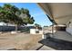 This backyard features a BBQ, pool, and a covered patio great for outdoor entertaining at 156 E Jasmine St, Mesa, AZ 85201