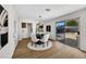 Cozy dining room with hardwood floors and access to the backyard patio at 156 E Jasmine St, Mesa, AZ 85201